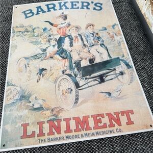 Vintage Barker's Liniment Metal Sign